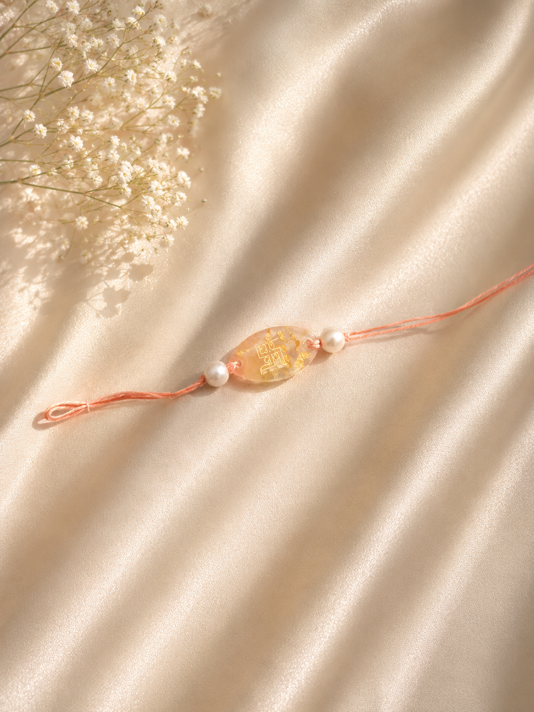 Swastik Pearl Resin Rakhi